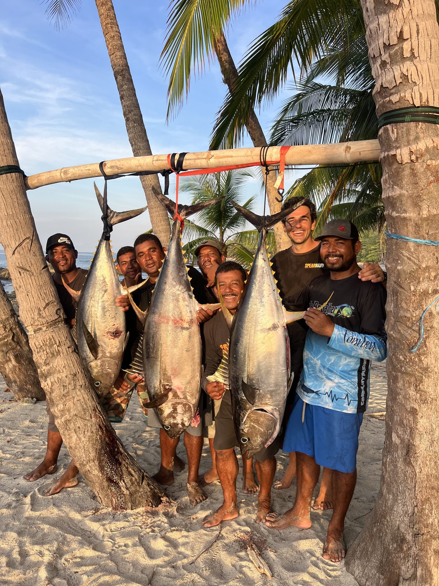 Rolando and the Spearbaby crew with tuna catch